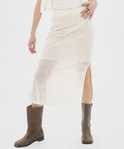 Best Sellers [NASTY FANCY CLUB] SS 22 PUNCHING KNIT SLIT LONG SKIRT (CREAM)_F22QD315