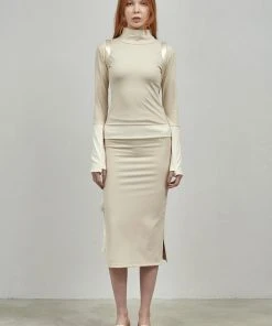[REHEAT] SS 22 LONG SLEEVE WARMER TOP & SKIRT_IVORY Best Sellers