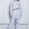 UNORMAL [UNUSUALNORMAL] FW 21 POINT SWEAT PANTS _ WHITE MELANGE